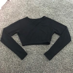 Black Varsity midriff medium v-neck dri-fit